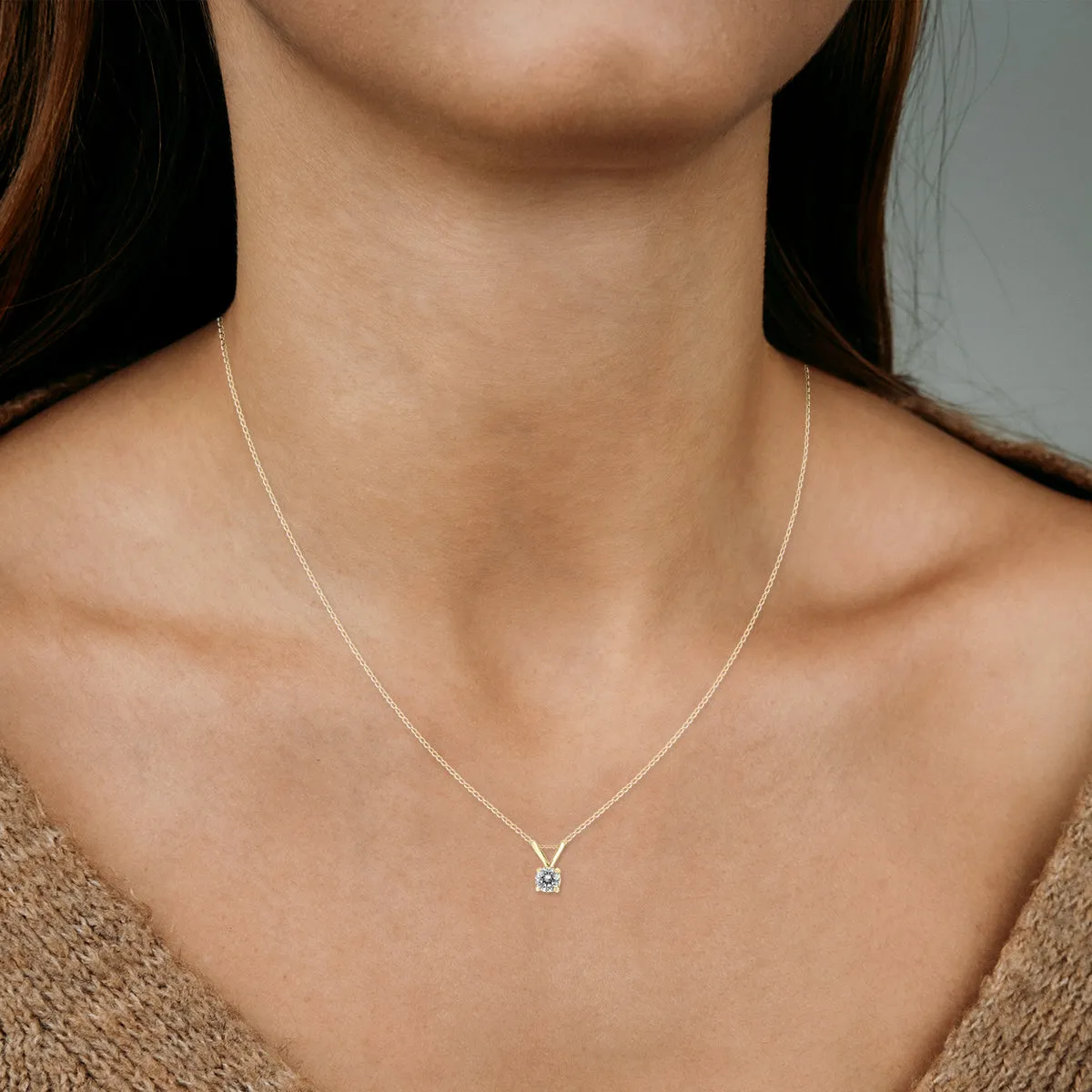 1/4 Carat Round Diamond Solitaire Pendant In 14K Yellow Gold