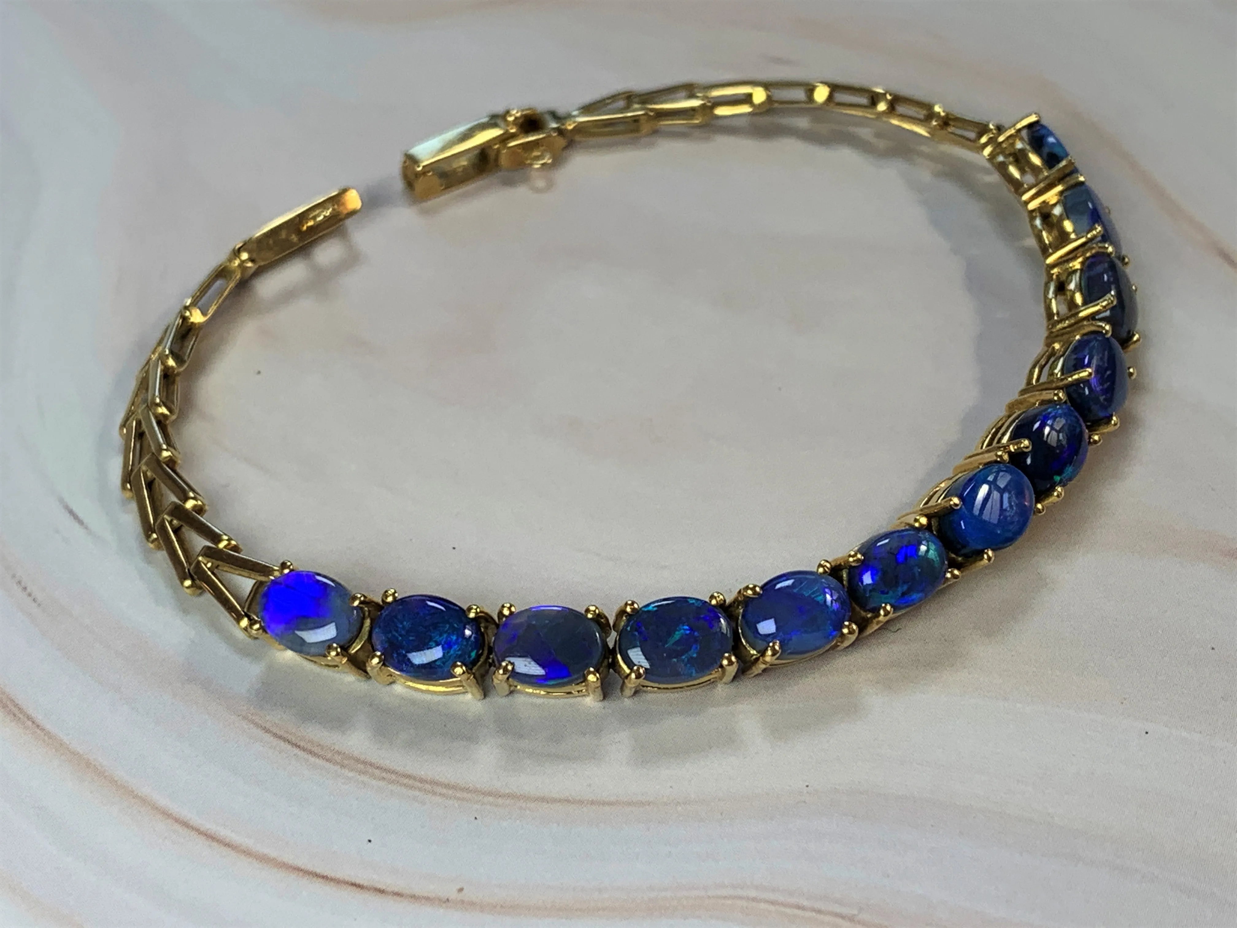 18kt Yellow Gold Black Opal 4.2ct bracelet
