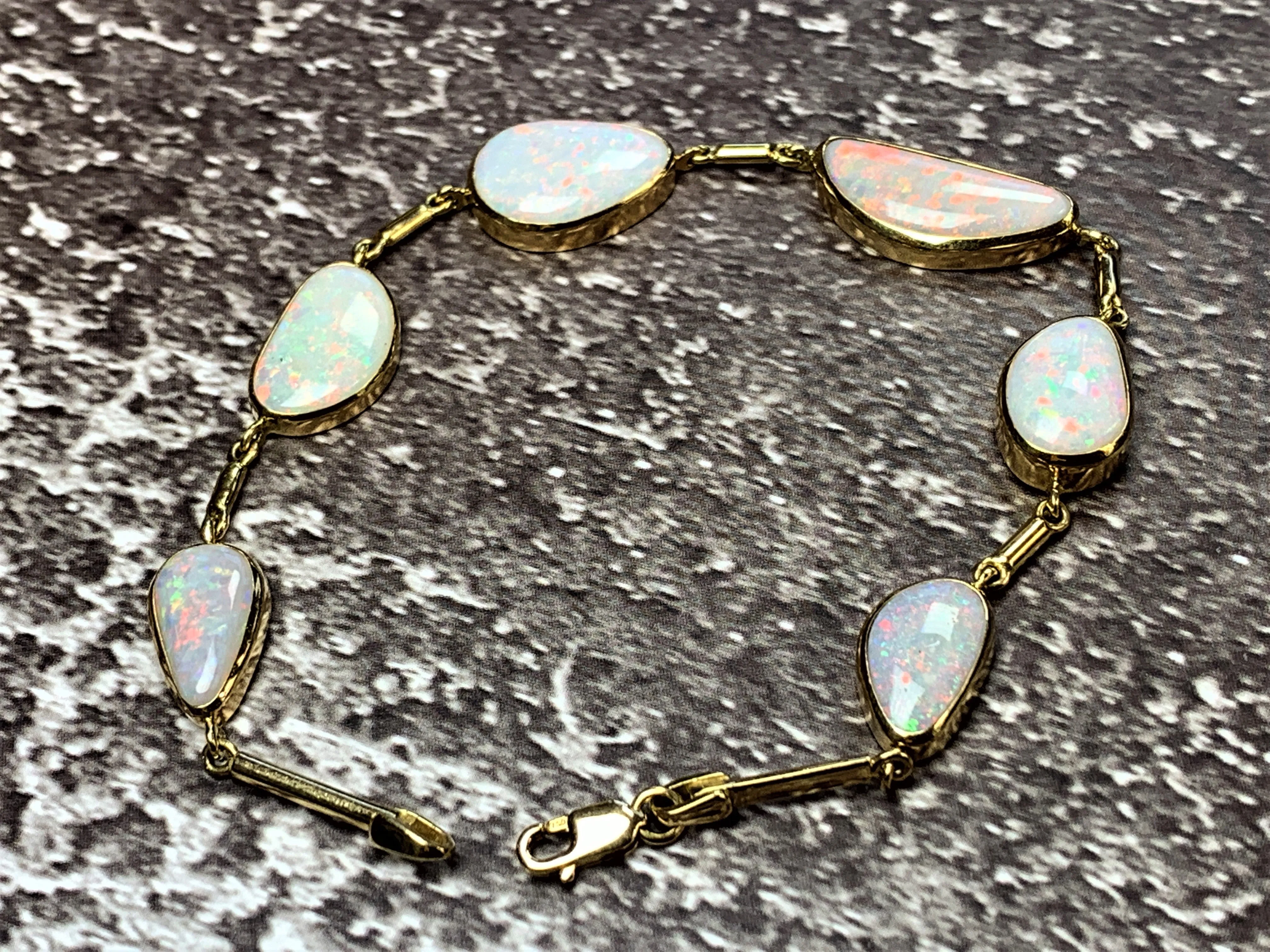 18kt Yellow Gold White Opal freeform 12.5ct bracelet
