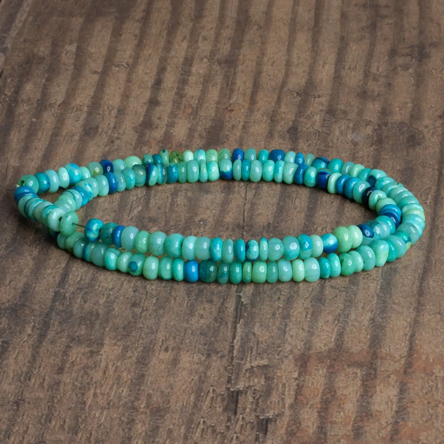 5mm Tide Pool Blue Opal Plain Rondelles 16 inch 130 beads