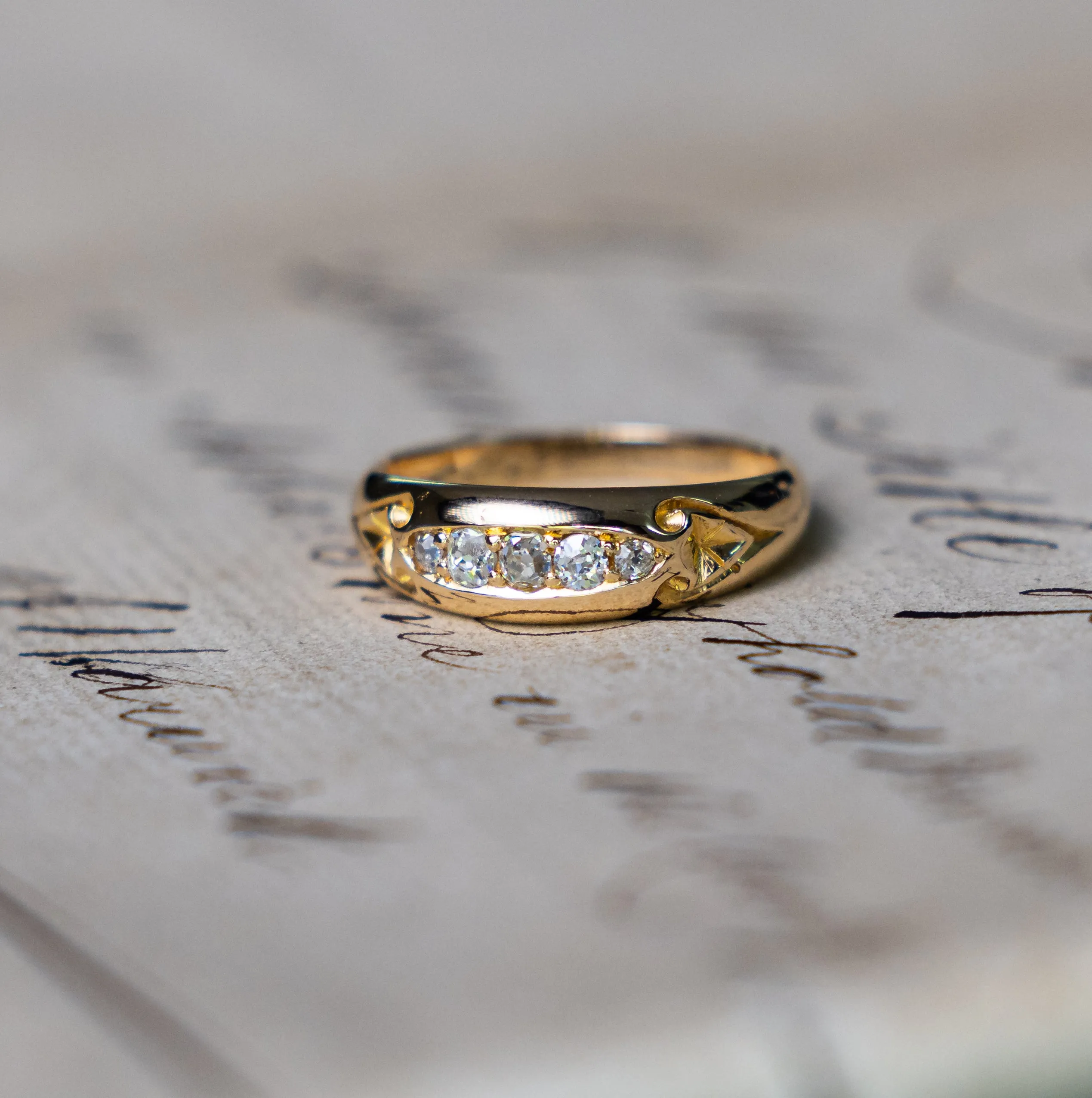 Antique, Edwardian five stone diamond engagement ring